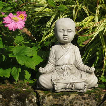Small meditating Buddha